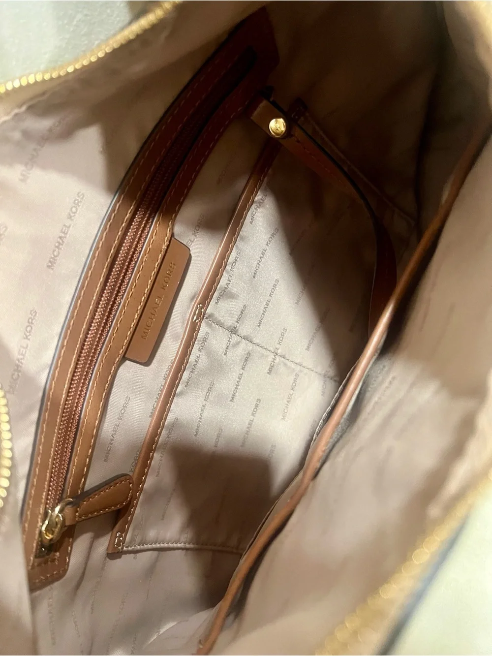 Michael Kors signature tone hardware